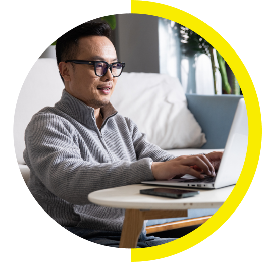 Man working on laptop at home