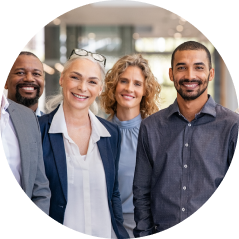 Smiling diverse group of professionals in office setting.