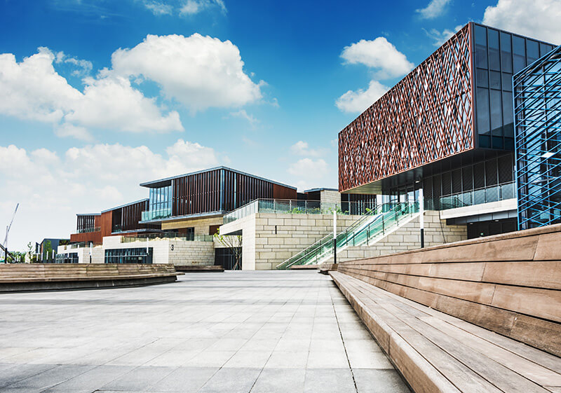 Modern architectural building with blue sky background.