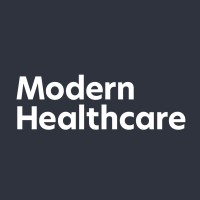 Modern Healthcare logo on dark background